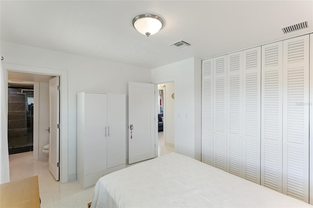 bedroom featuring ensuite bath