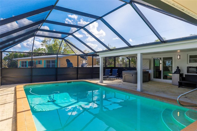 view of pool featuring a patio area and a lanai