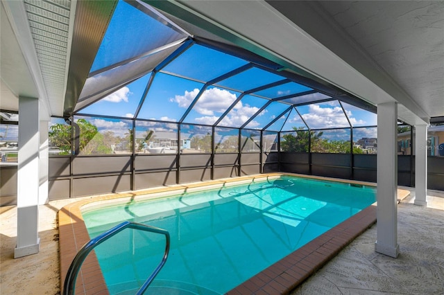 view of pool featuring a lanai and a patio area