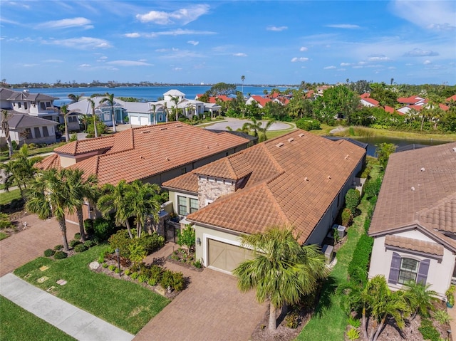 drone / aerial view with a water view