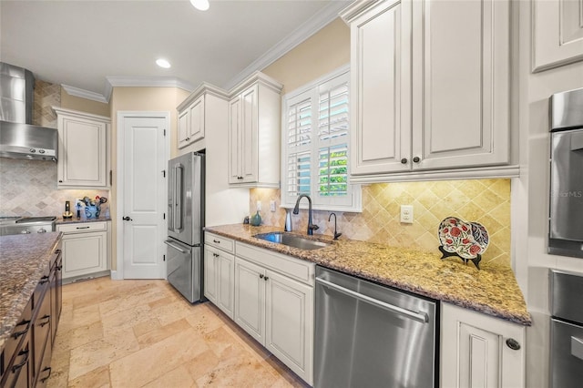 kitchen with appliances with stainless steel finishes, sink, and white cabinets