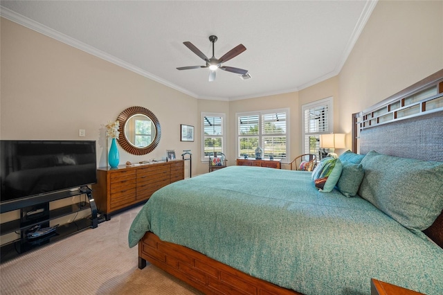 bedroom featuring crown molding, carpet floors, and ceiling fan