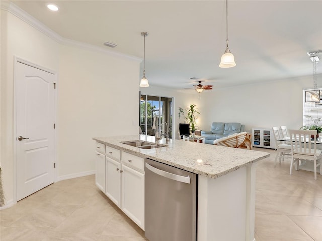 kitchen with dishwasher, an island with sink, a sink, and pendant lighting