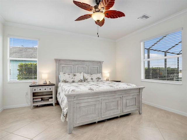 bedroom with light tile patterned floors, a ceiling fan, visible vents, baseboards, and ornamental molding