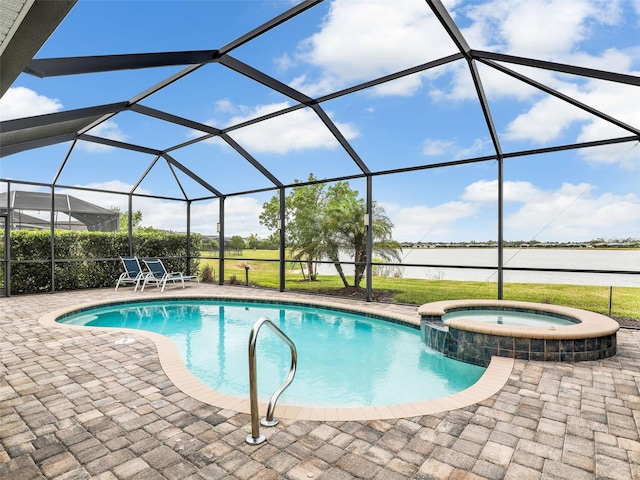 view of pool featuring a water view, a pool with connected hot tub, a lanai, and a patio