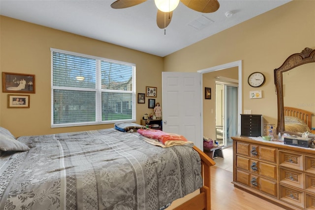 bedroom featuring light wood-type flooring and ceiling fan