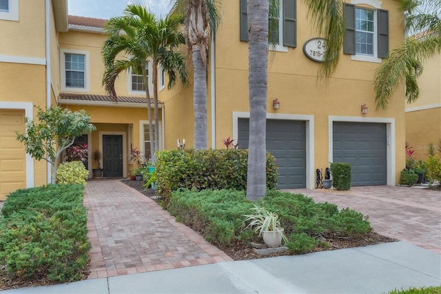 view of front of property with a garage