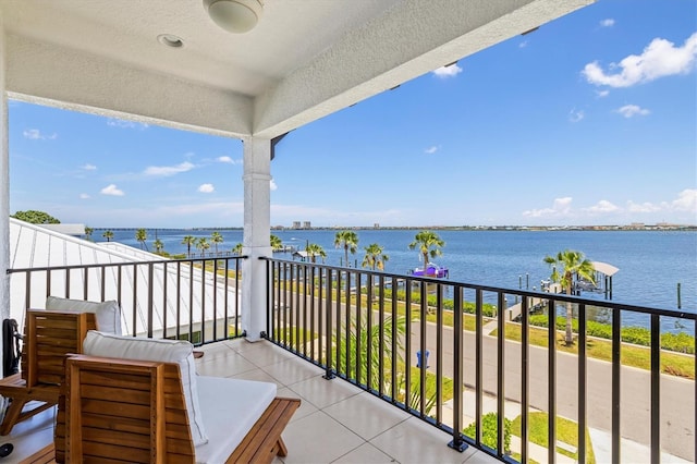 balcony featuring a water view