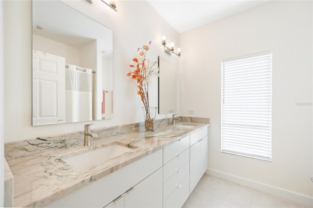 bathroom with vanity and tile patterned floors