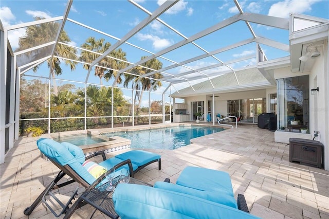 view of pool with a patio, an in ground hot tub, a lanai, an outdoor hangout area, and grilling area