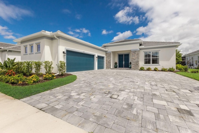 view of front of property with a garage