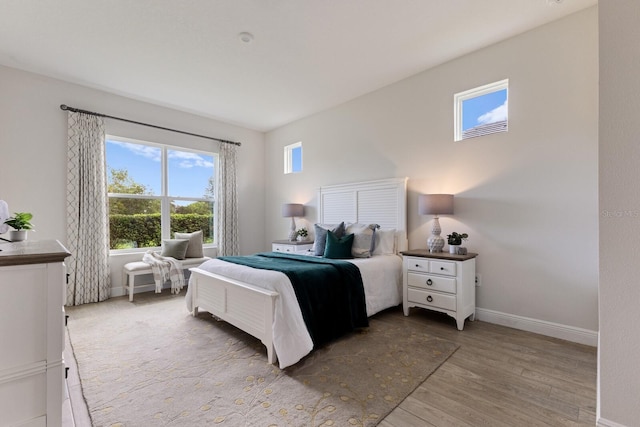 bedroom with wood-type flooring