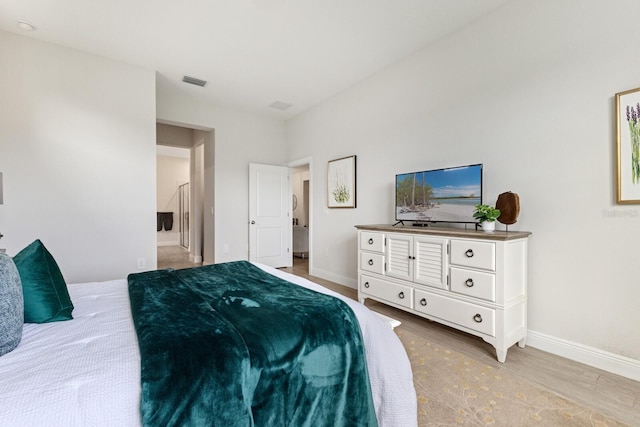 bedroom featuring light hardwood / wood-style floors