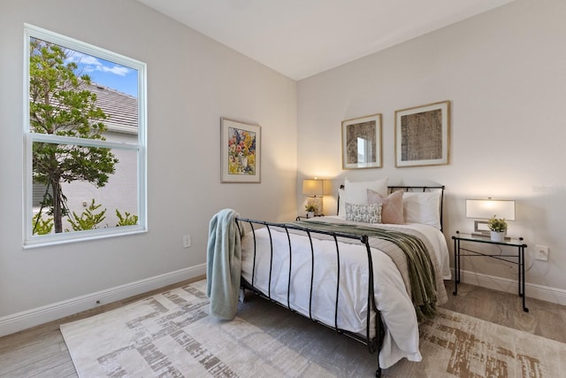 bedroom with light hardwood / wood-style flooring