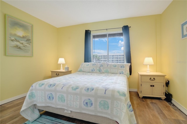 bedroom featuring light wood-type flooring