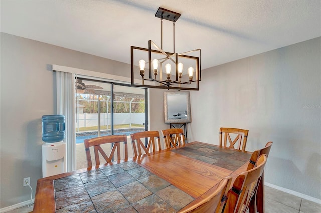 dining area featuring a chandelier