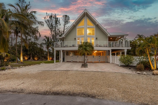 raised beach house with a carport