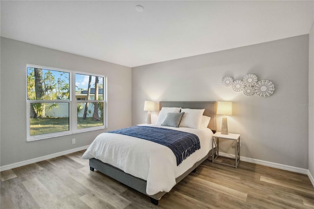 bedroom featuring hardwood / wood-style flooring