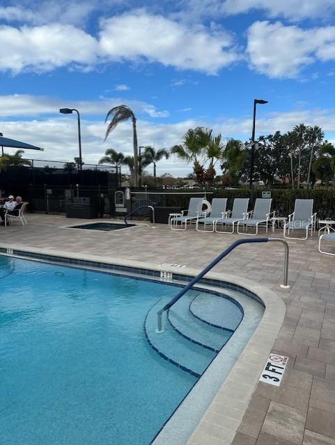 view of swimming pool with a patio area