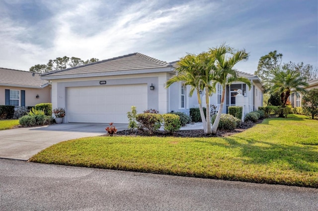 1570 Monarch Dr, Venice, FL 34293 - ranch-style house featuring a front yard and a garage