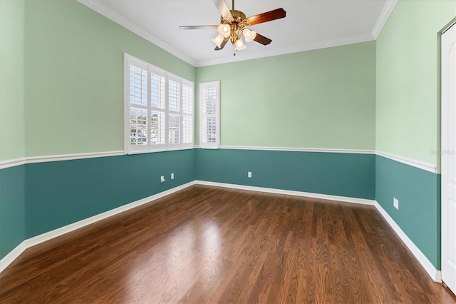 unfurnished room with ceiling fan, dark hardwood / wood-style flooring, and ornamental molding