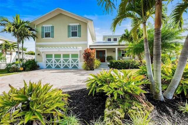 view of front of property featuring a garage