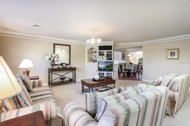 living room with light carpet, a chandelier, and ornamental molding