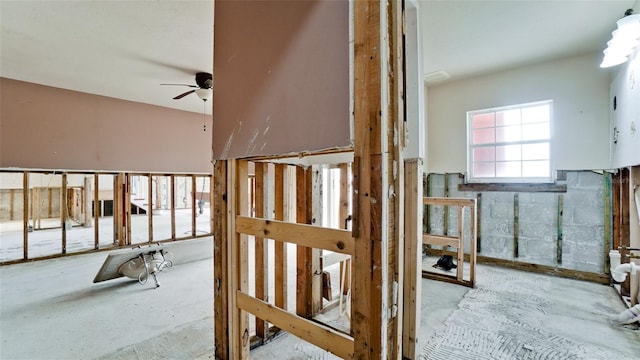 stairs with ceiling fan