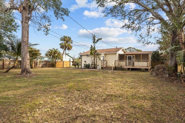 view of yard featuring a deck