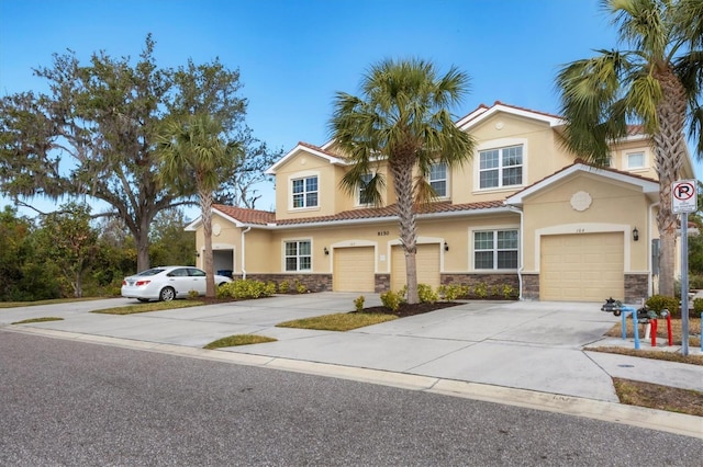 view of front of home with a garage