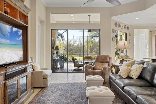 tiled living room featuring crown molding and ceiling fan