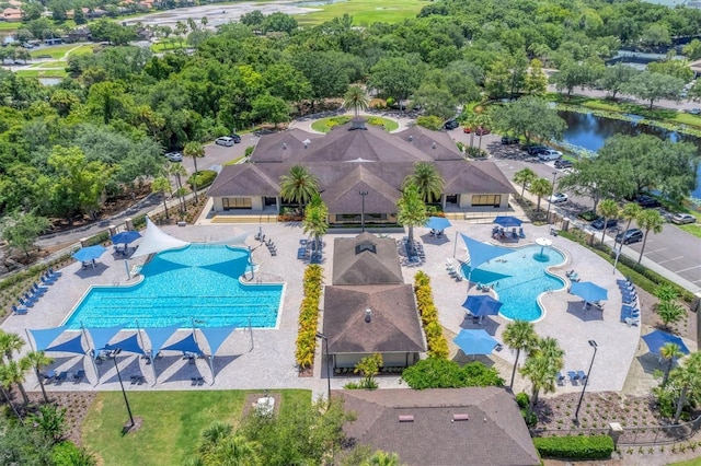 birds eye view of property featuring a water view