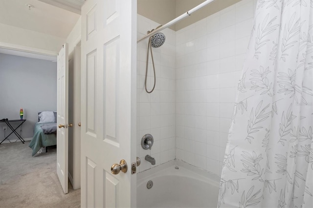 bathroom featuring shower / bath combo with shower curtain