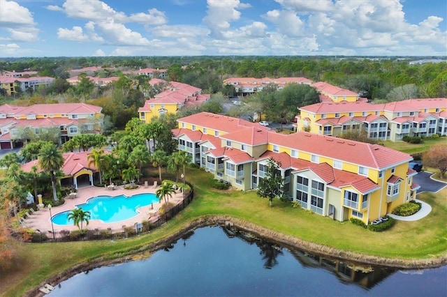 drone / aerial view with a water view