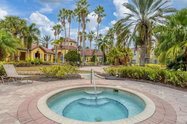 view of pool featuring a hot tub