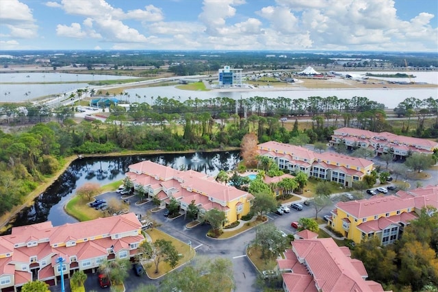 drone / aerial view with a water view