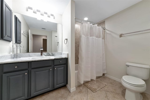 full bathroom featuring toilet, vanity, shower / bath combo, and tile patterned flooring