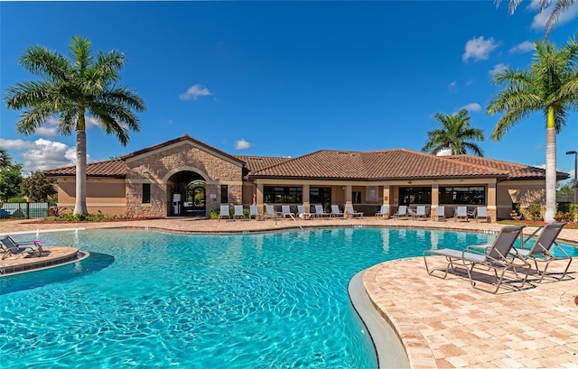 view of swimming pool featuring a patio