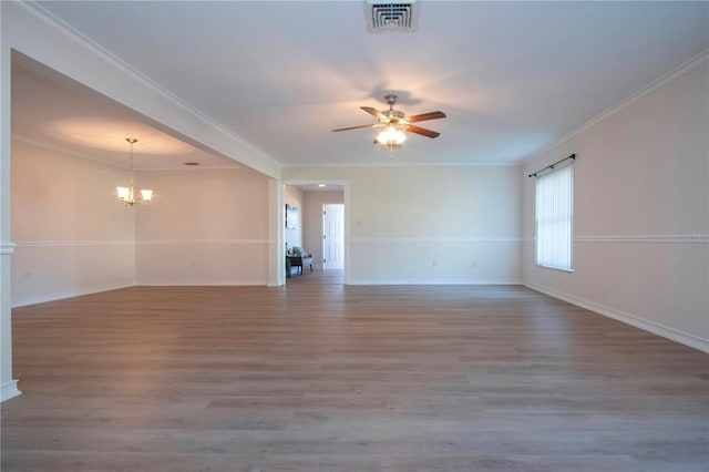 unfurnished room with ceiling fan with notable chandelier, light hardwood / wood-style flooring, and crown molding