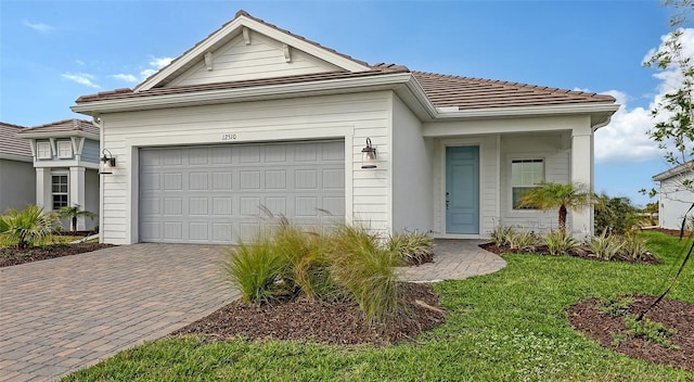 view of front of property featuring a garage