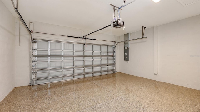 garage featuring a garage door opener and electric panel