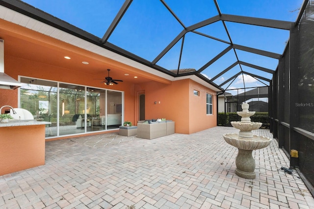 view of patio / terrace featuring a grill and ceiling fan