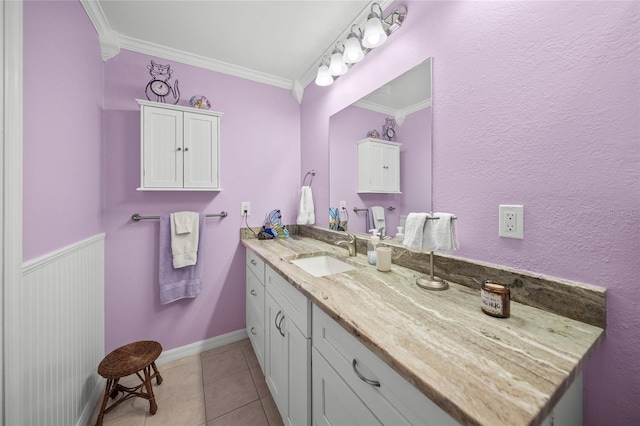 bathroom with vanity, tile patterned floors, and ornamental molding