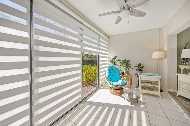 interior space featuring ceiling fan