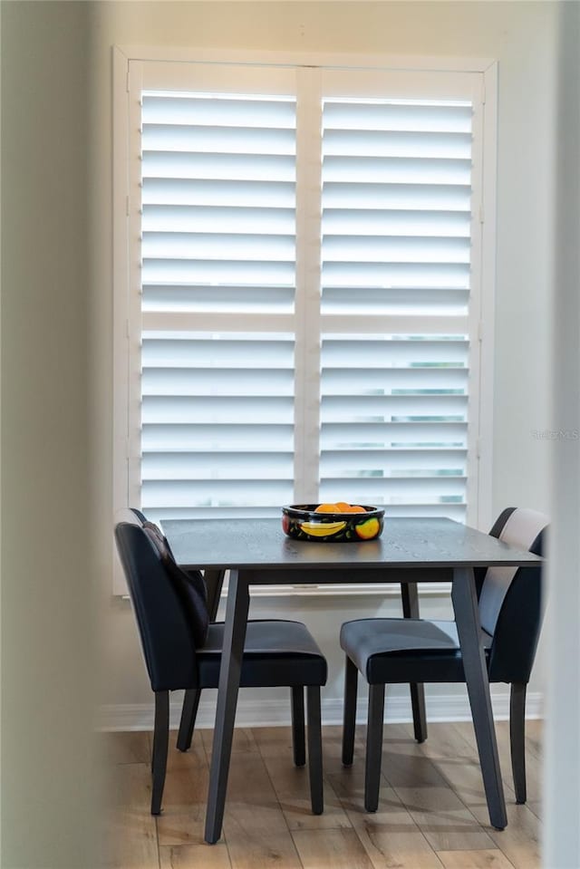 dining area with light tile patterned floors