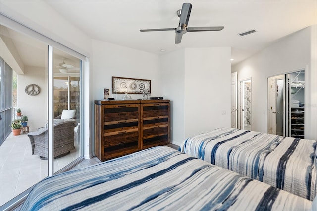 bedroom featuring ceiling fan and connected bathroom