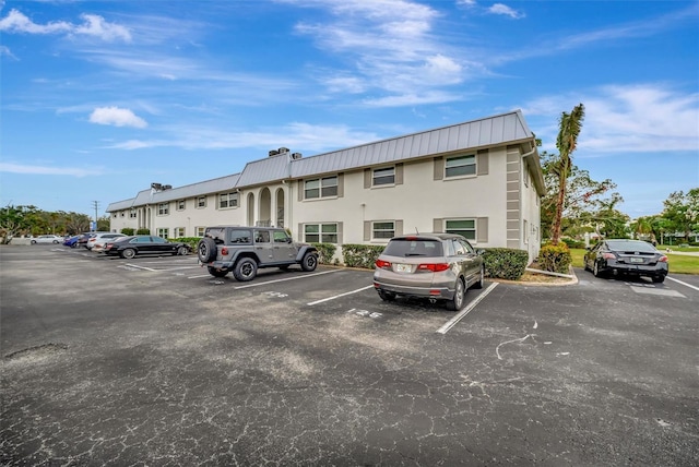 view of parking / parking lot