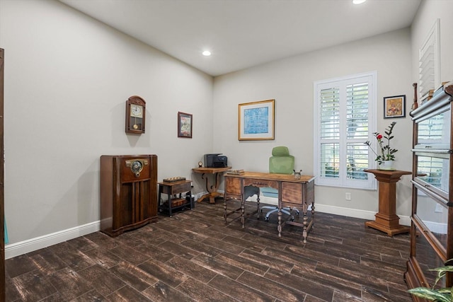 office space with dark hardwood / wood-style flooring