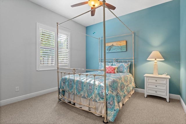 bedroom with ceiling fan and carpet flooring