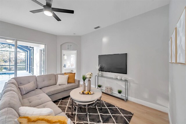 14146 Cattle Egret Pl, Bradenton, FL 34202 - living room with ceiling fan and hardwood / wood-style flooring